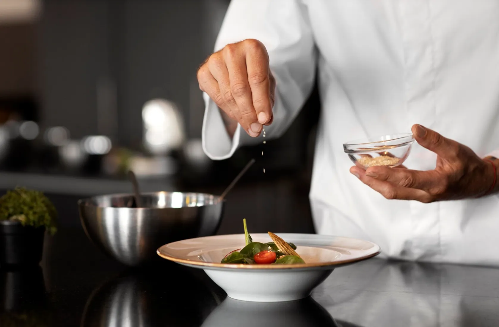 A private chef reviewing a menu with a client in their home